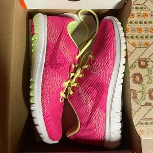 Brand new in box Nike Flex Fury. Super sure pink and fluorescent yellow.